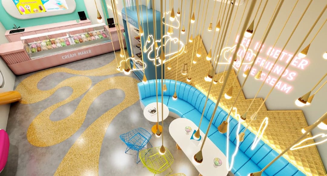Overhead view of a branded café seating area with pendant lighting