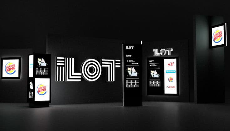 The ILOT signage family rendered as a line-up: totems, directories and illuminated panels.