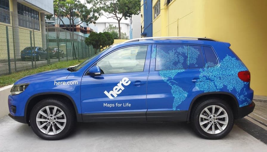 A HERE data capture car in the world-map livery.