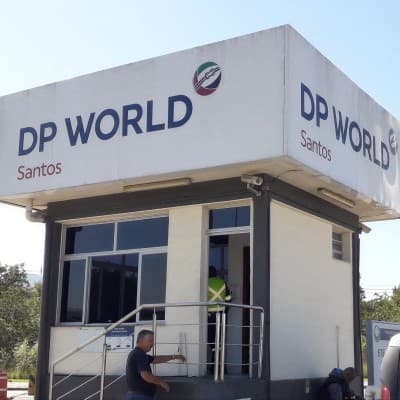 The DP World Santos gatehouse, the wordmark on its exterior wall.