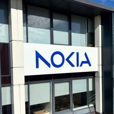 The Nokia wordmark on the exterior facade of an office building.