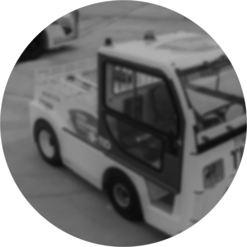 A branded utility vehicle on an airport apron
