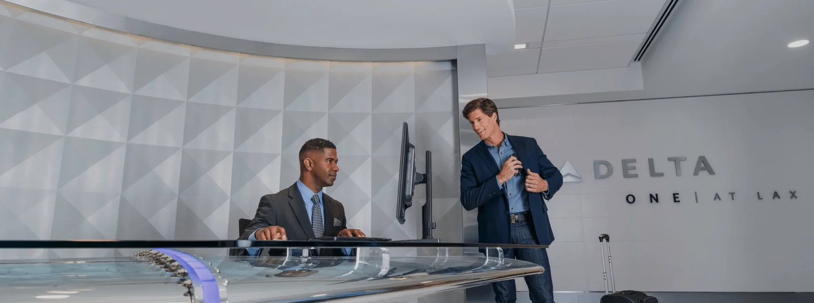 Premium brand experience signage for Delta One