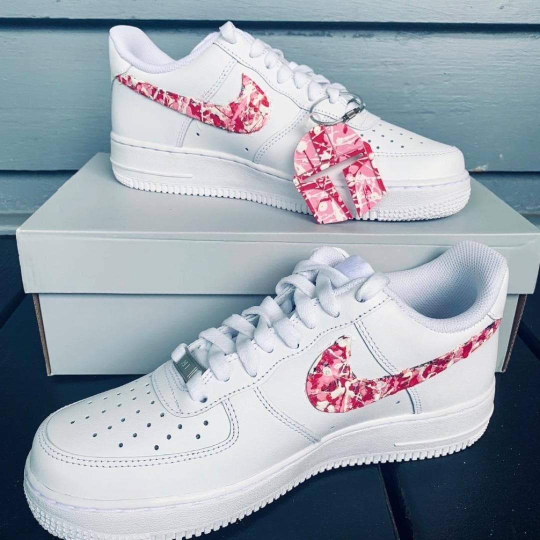 Adam's drip-art design applied to a pair of Nike Air Force 1 sneakers
